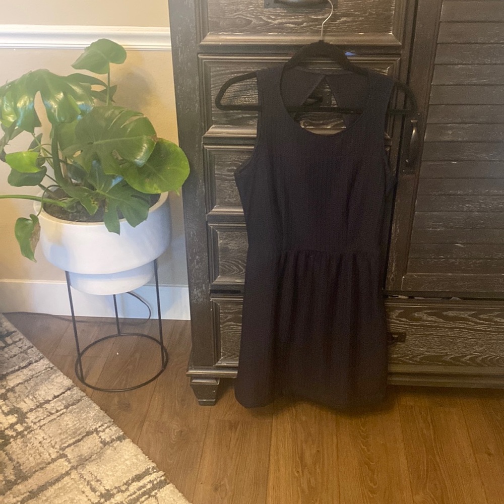 Medium olive and oak navy eyelet fit and flare dress.